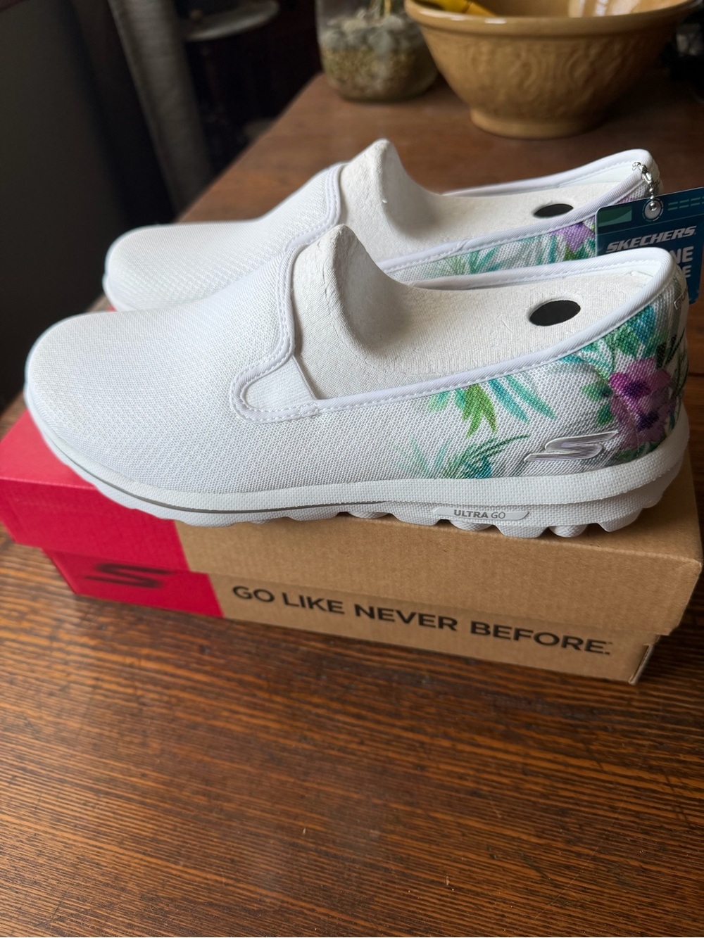 Skechers White Slip-On Kids Sneakers with Green & Purple Floral Accent